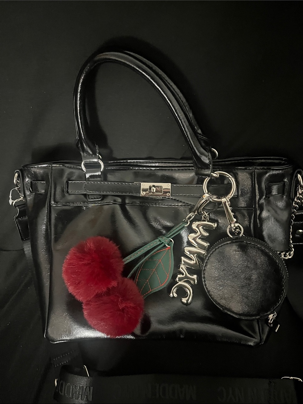 Madden NYC Black Patent Satchel with Red Pom Charm - Picture 2 of 3